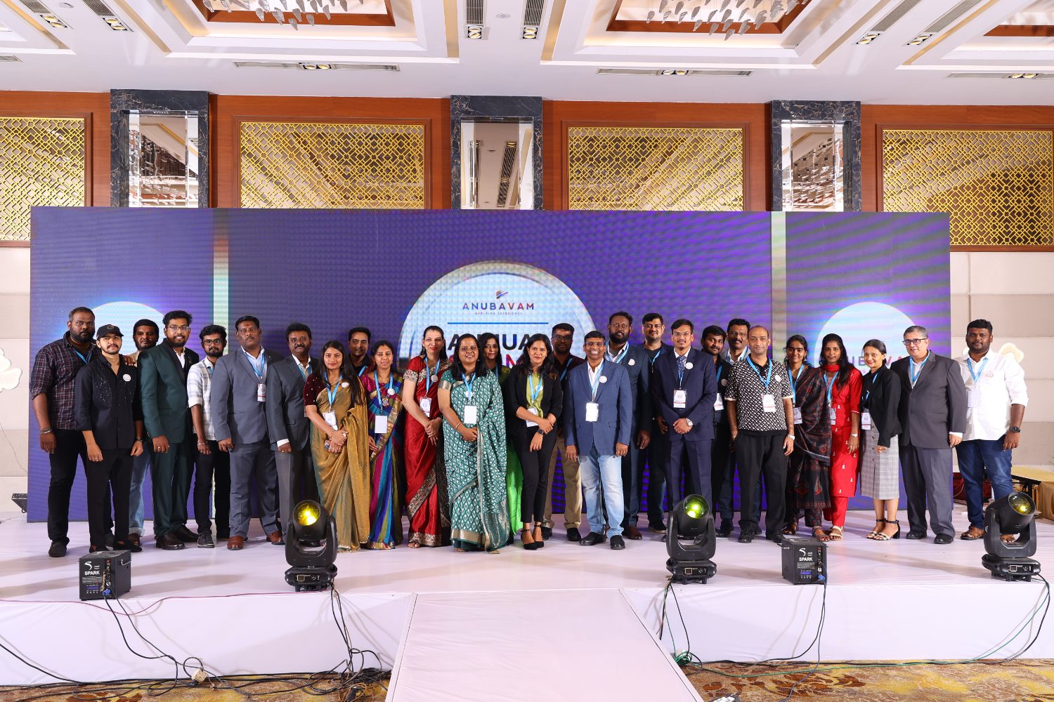 Anubavam leaders and managers on stage at the annual summit
