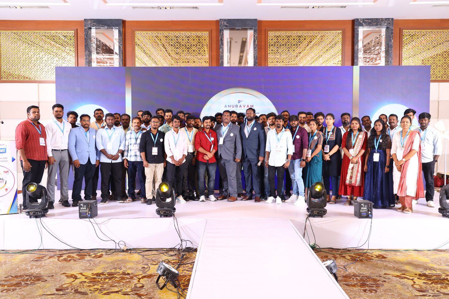 Delivery and engineering teams on stage at the Anubavam annual summit
