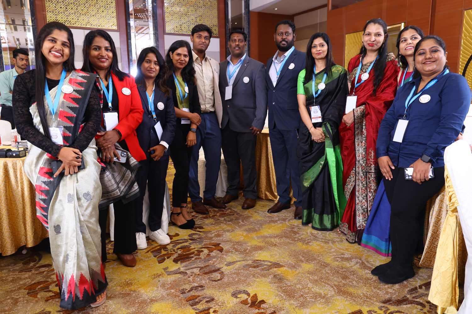 Colleagues together between sessions at the annual summit