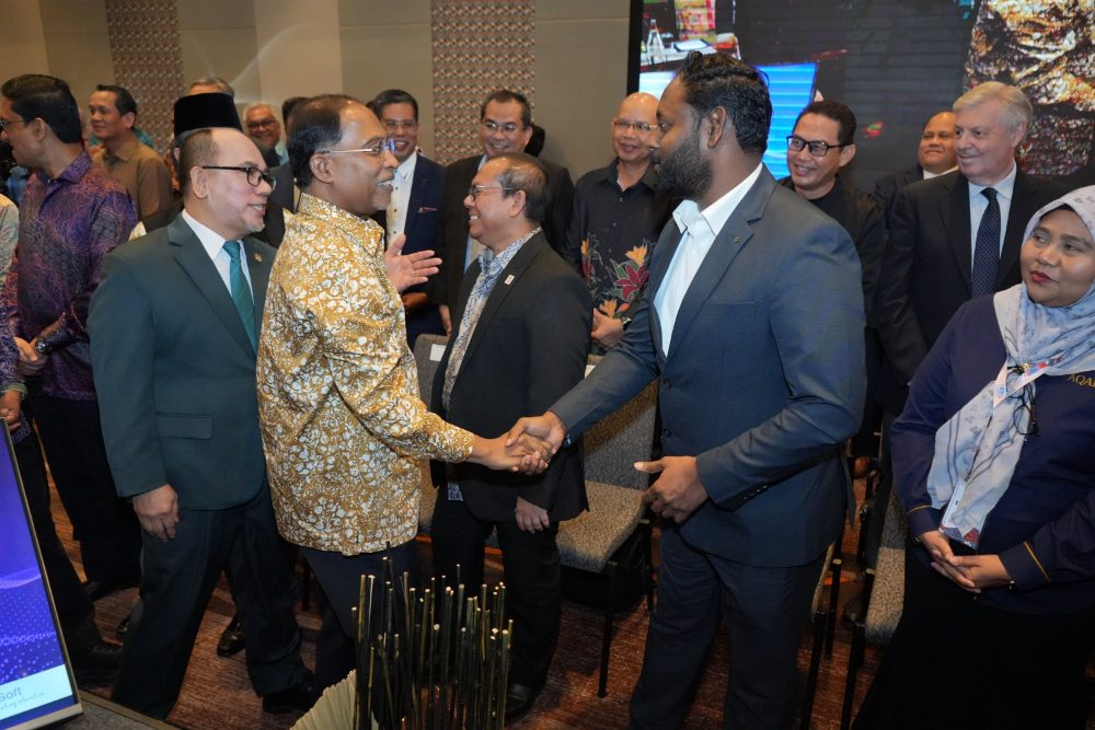 Creatrix Campus leadership greeting the Minister of Higher Education at the MQA Presidents' Forum 2026